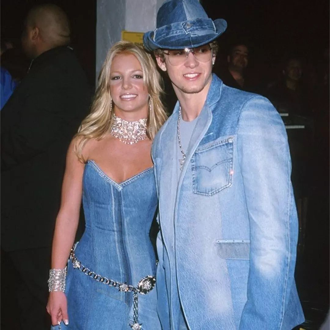Britney Spears and Justin Timberlake wearing matching denim outfits and accessories.