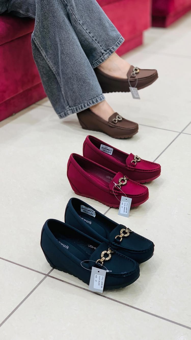 Clothing and Shoes: 8 Ideas for Everyday Outfits 7 Brown, red, and navy blue loafers paired with grey denim jeans on tiled floor