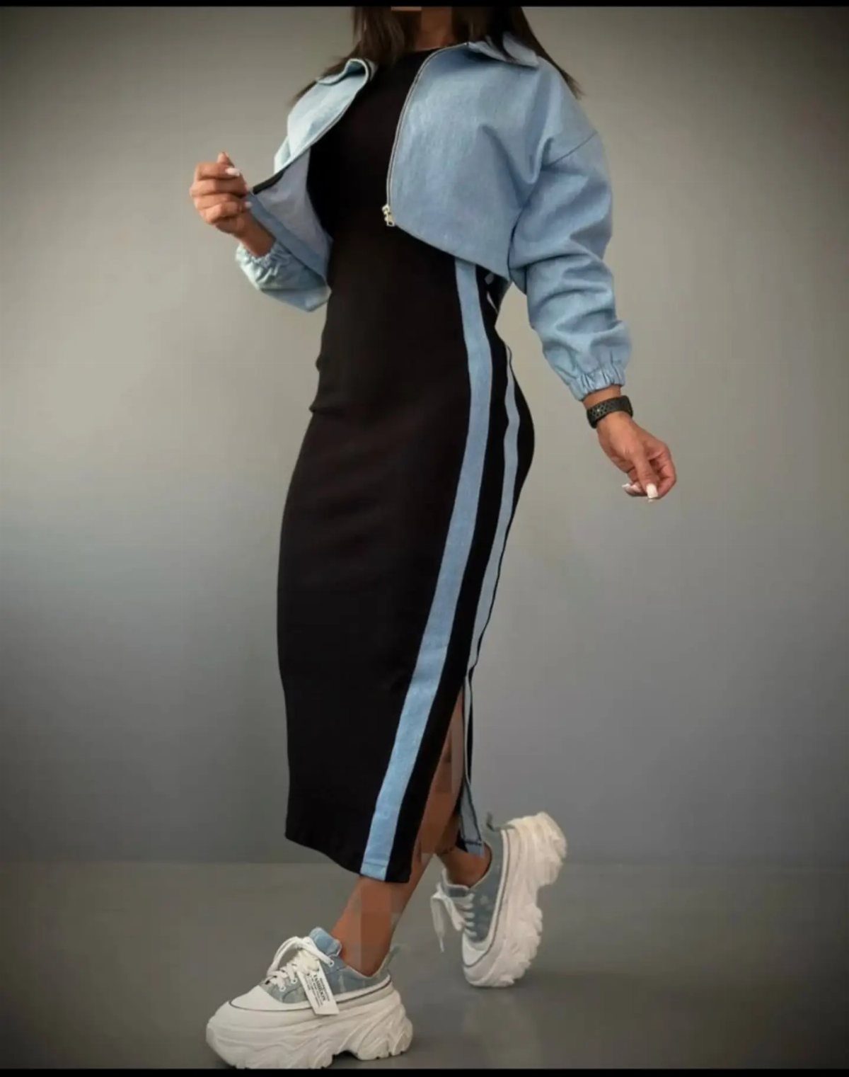 9 Dress and Coat Outfit Ideas for Work, Evenings and More 3 Person wearing a cropped blue denim jacket and black striped midi dress with sneakers