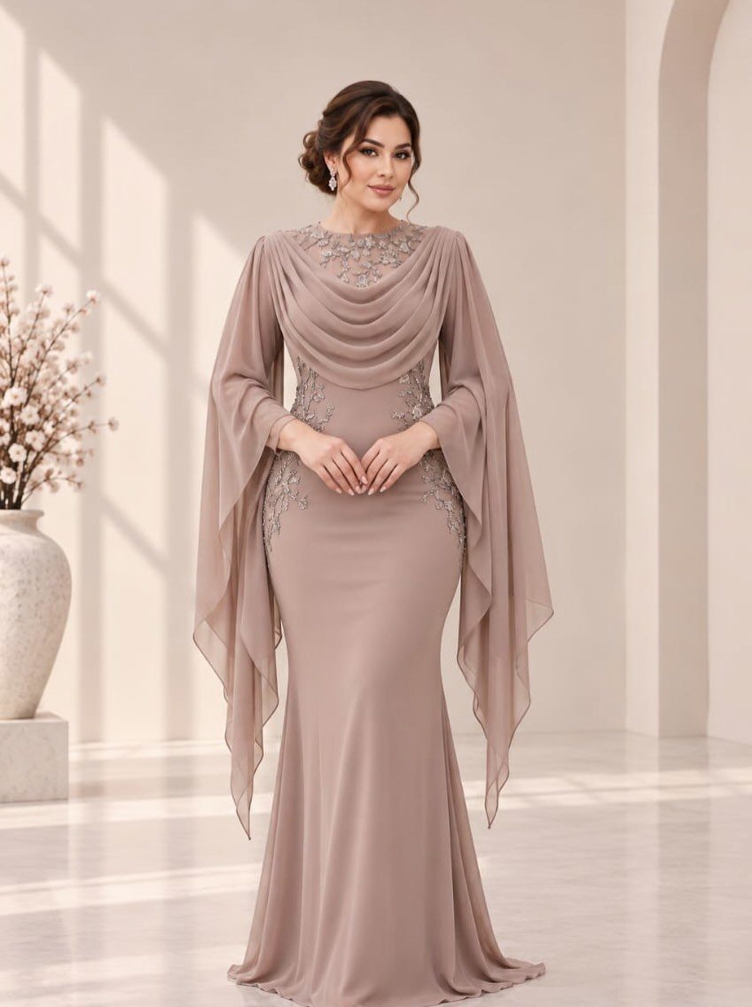 Woman in a mauve fantasy gown with draped cape sleeves and silver embroidery.