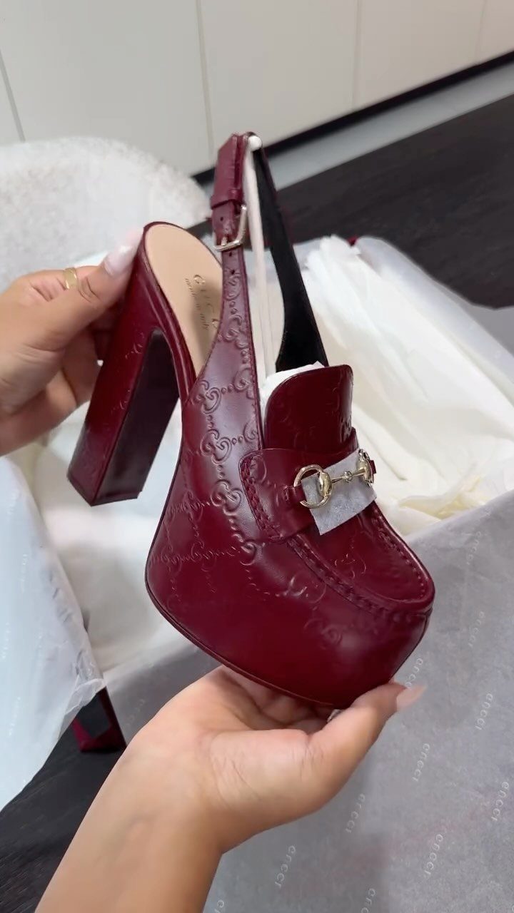 High Heels Design Ideas: 9 Styles from Slingbacks to Platforms 8 Deep red leather loafer heel with block heel and gold horsebit detail.