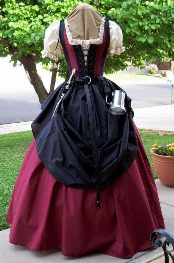 Medieval maid outfit with burgundy skirt, black bodice, and cream blouse on mannequin.