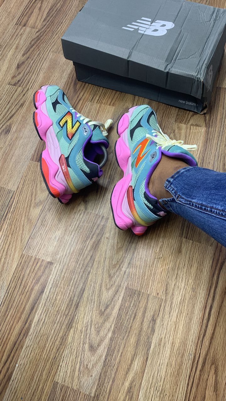 New Balance 9060 All Colors: 8 Pairs to Consider 8 Pink, yellow, and teal New Balance 9060 sneakers worn with blue jeans.